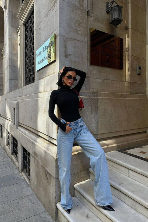 Women's ribbed bodysuit with roll neck front view pose