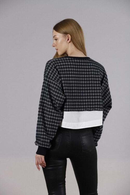 woman's short blouse seen from the back