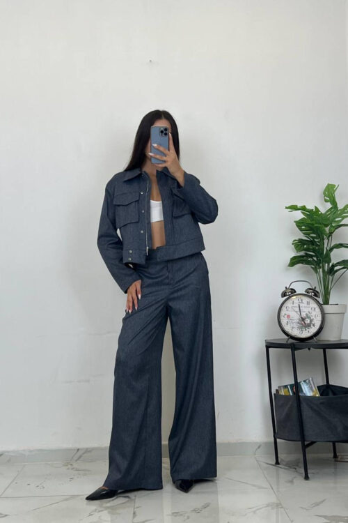 women's navy blue two-piece suit front view open jacket pose